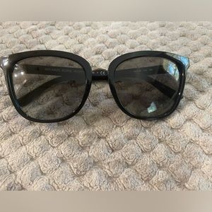 Michael Kors Mykonos black and silver sunglasses with case.